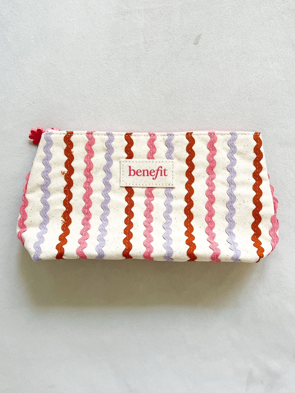 benefit Wavy Stripe Cosmetic Pouch in White & Pink Like New